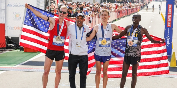 3 Men Wrapped in American Flag at Marathon Finish Line